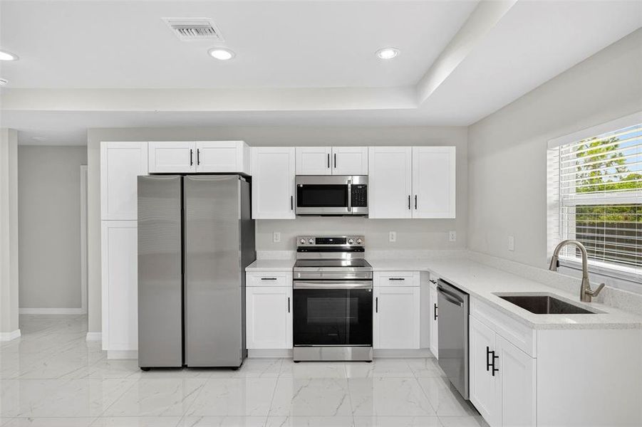 Furnished interior view inside a new home in , Lehigh Acres (Image 8).