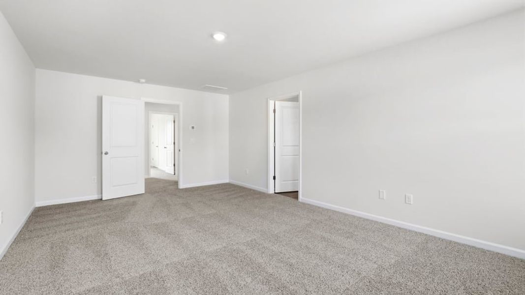 Spacious, unfurnished interior of a new home in Bentley Park, Greenwood (Image 33).