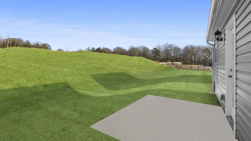 Exterior details and patio area of a home in Village Grove, Greenville (Image 16).
