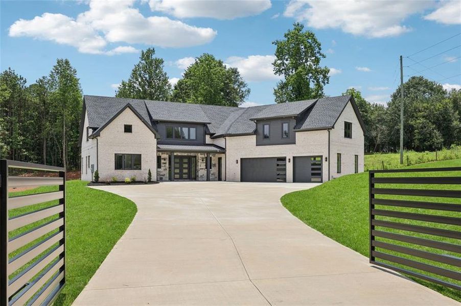 Front exterior of a new home in , Braselton, GA, highlighting curb appeal (Image 32). Front exterior of a new home in , Braselton, GA, highlighting curb appeal (Image 32).