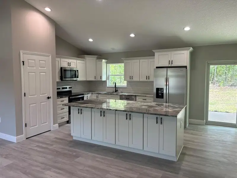 Furnished interior view inside a new home in , Dunnellon (Image 6).