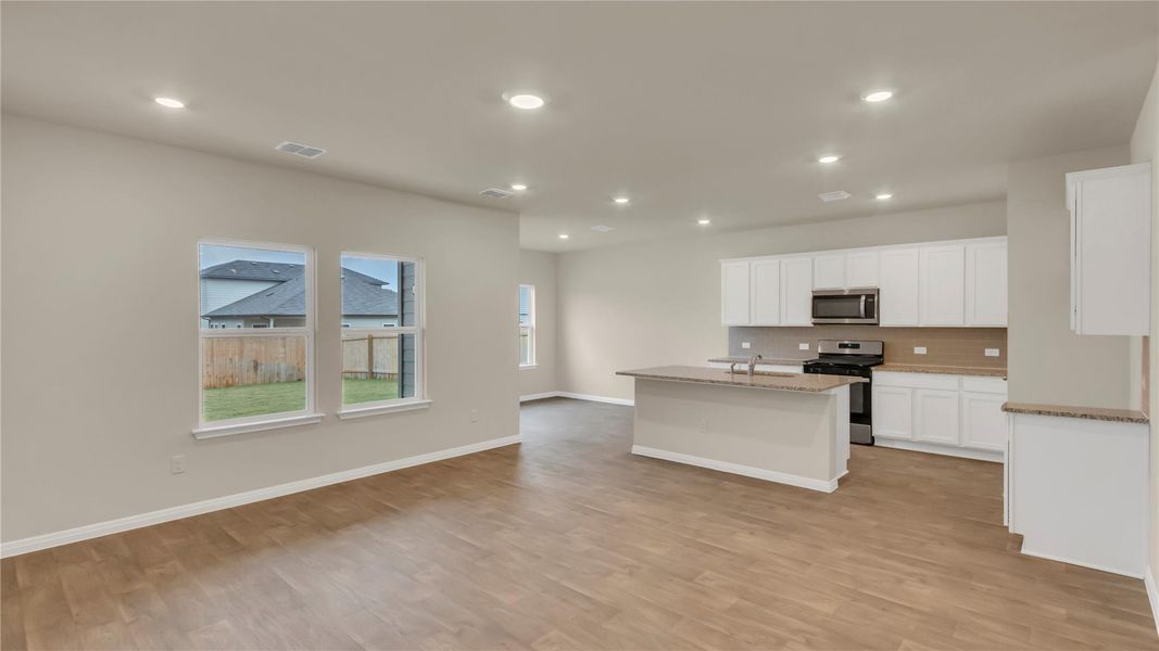 Furnished interior view inside a new home in Carillon, Manor (Image 11).