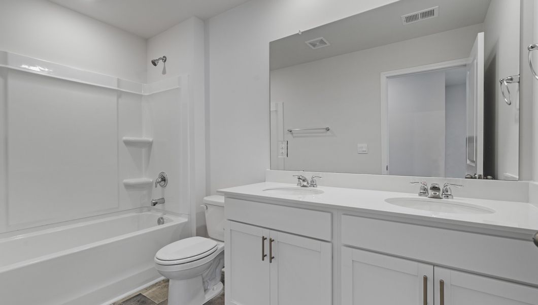 Representative furnished interior of a home built from the Elston by D.R. Horton in Mableton Station, Mableton (Image 3).