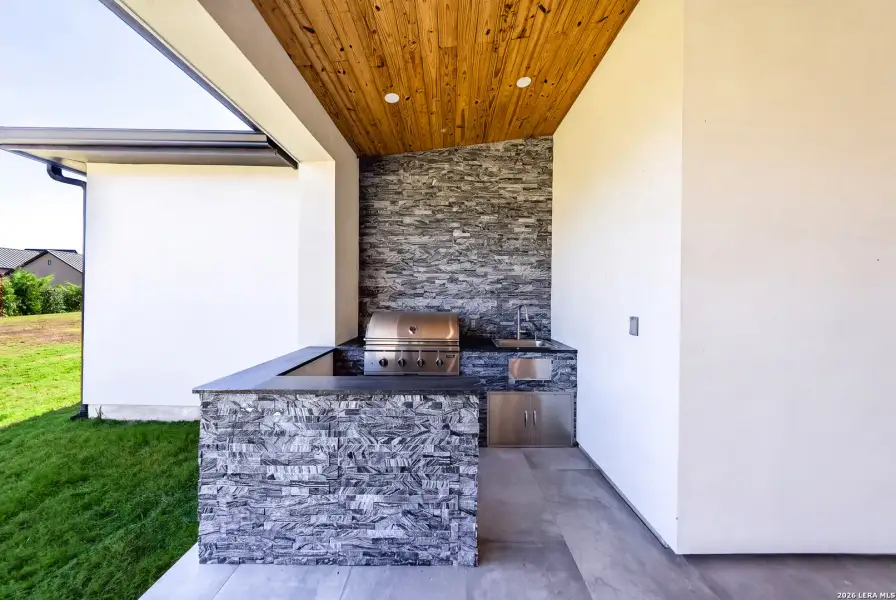 Exterior details and patio area of a home in , San Antonio (Image 45).