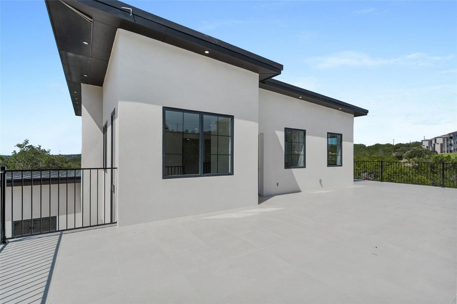 Exterior details and patio area of a home in , Lago Vista (Image 3).