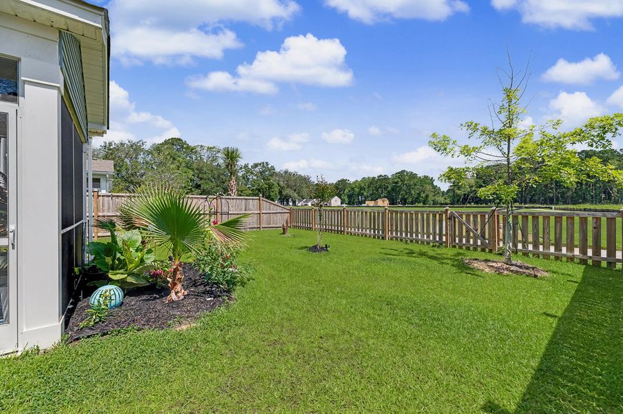 Exterior details and patio area of a home in Six Oaks, Summerville (Image 29).
