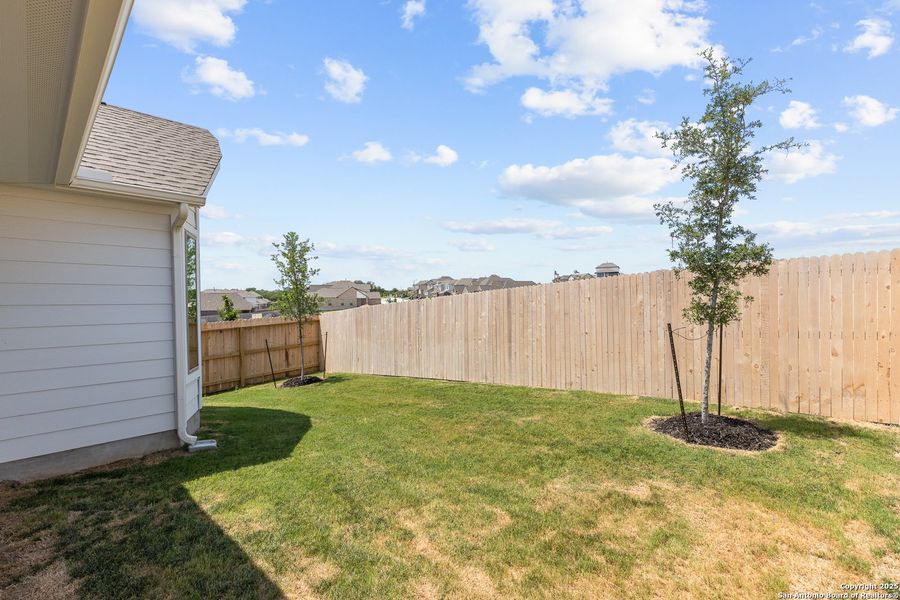Front exterior of a new home in Ladera, San Antonio, TX, highlighting curb appeal (Image 20). Front exterior of a new home in Ladera, San Antonio, TX, highlighting curb appeal (Image 20).