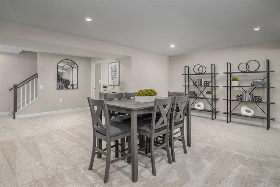 Representative furnished interior of a home built from the Eden Cay Basement by Ryan Homes in Basildon Ranches, Lancaster (Image 21).
