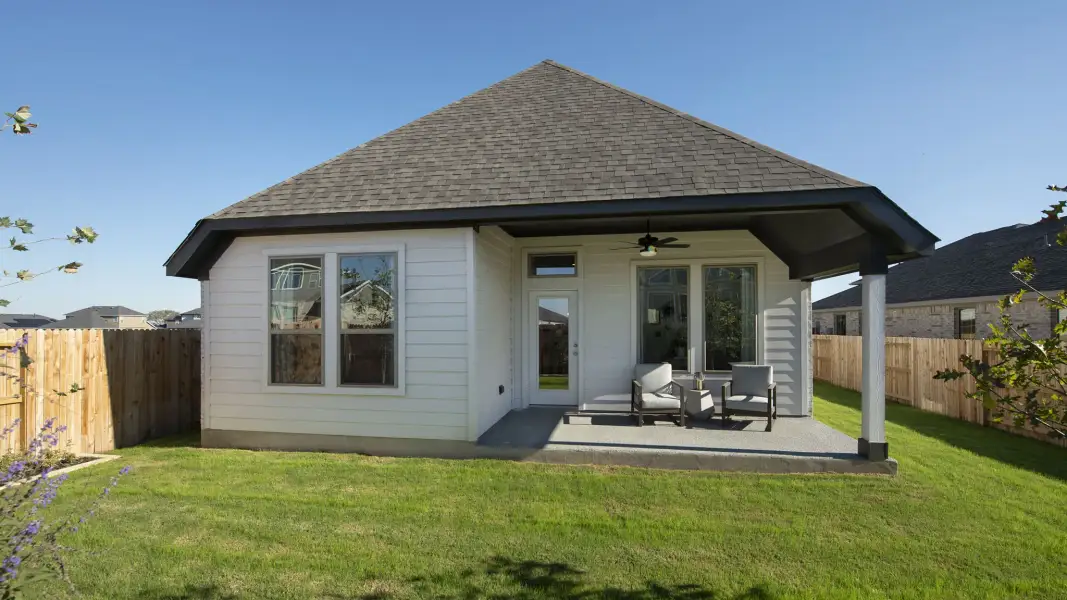 Exterior details and patio area of a home in Woodhavyn, Magnolia (Image 4).