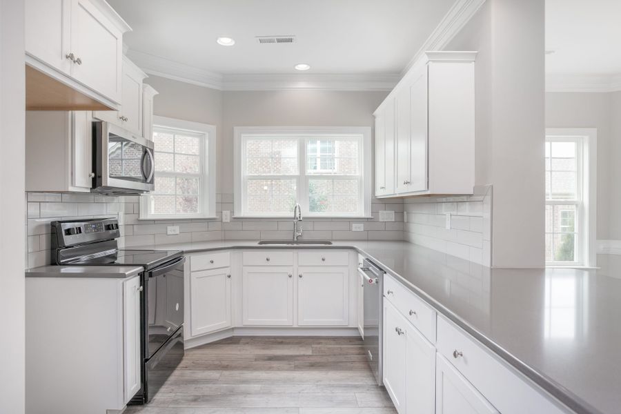Representative furnished interior of a home built from the Kingston by Keystone Homes NC in Weybridge, Burlington (Image 10).