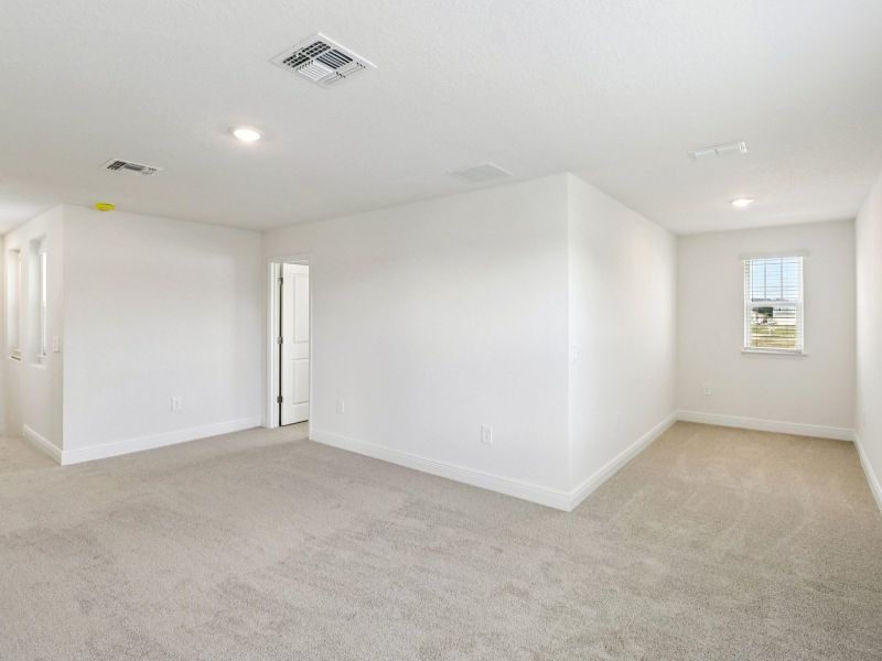 Spacious, unfurnished interior of a new home in The Reserve at Hammock Oaks - Classic Series, Lady Lake (Image 10). Spacious, unfurnished interior of a new home in The Reserve at Hammock Oaks - Classic Series, Lady Lake (Image 10).