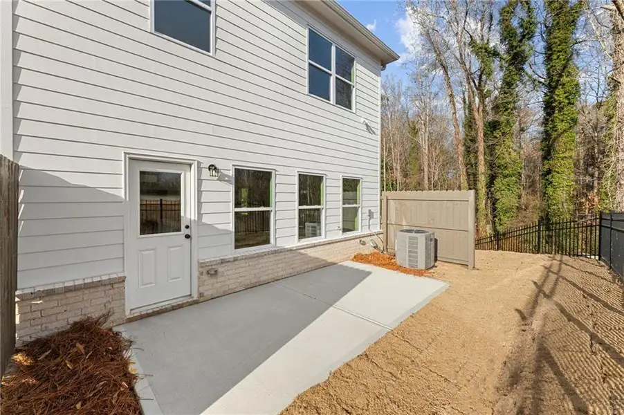 Exterior details and patio area of a home in River Walk Place, Lawrenceville (Image 4).