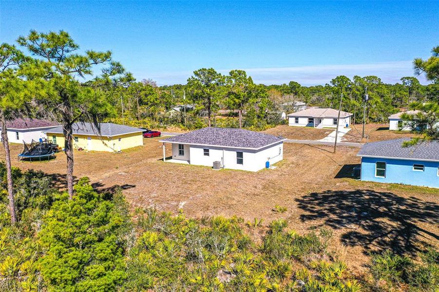Exterior details and patio area of a home in , Lake Placid (Image 13).