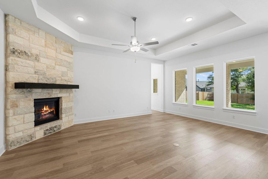 Family Room with tray ceiling & fireplace
