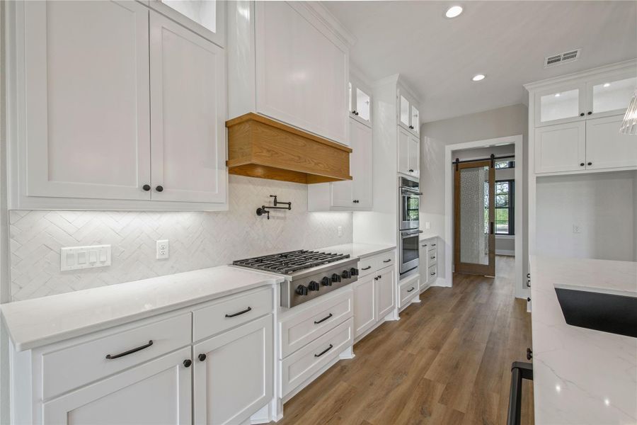 Furnished interior view inside a new home in , College Station (Image 8).