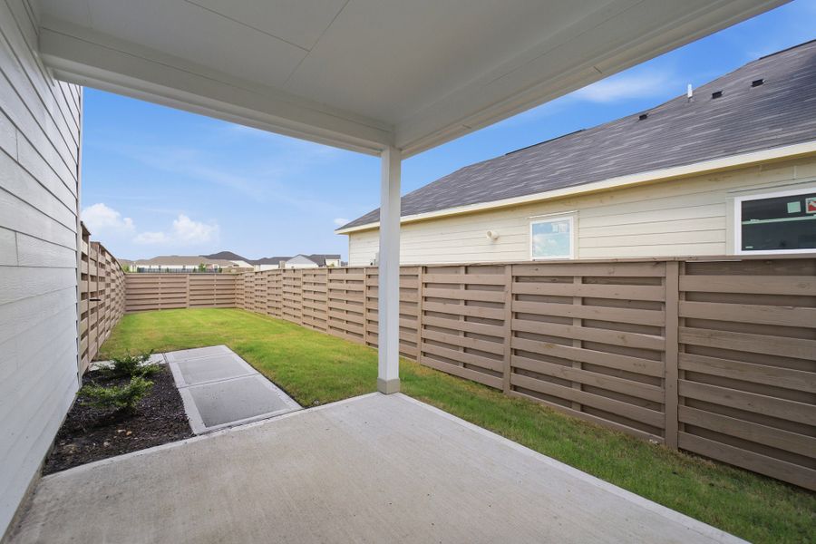 Exterior details and patio area of a home in Austin Point, Richmond (Image 28).
