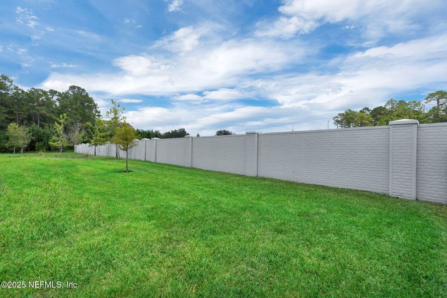 Exterior details and patio area of a home in Summer Bay at Grand Oaks, St. Augustine (Image 23). Exterior details and patio area of a home in Summer Bay at Grand Oaks, St. Augustine (Image 23).