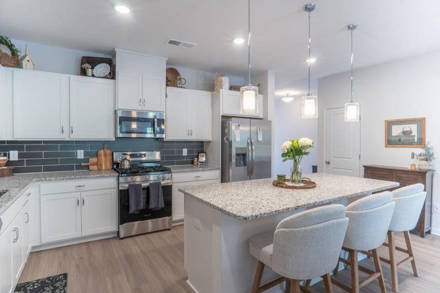 Furnished interior view inside a new home in Ellison Square, Sugar Hill (Image 14).