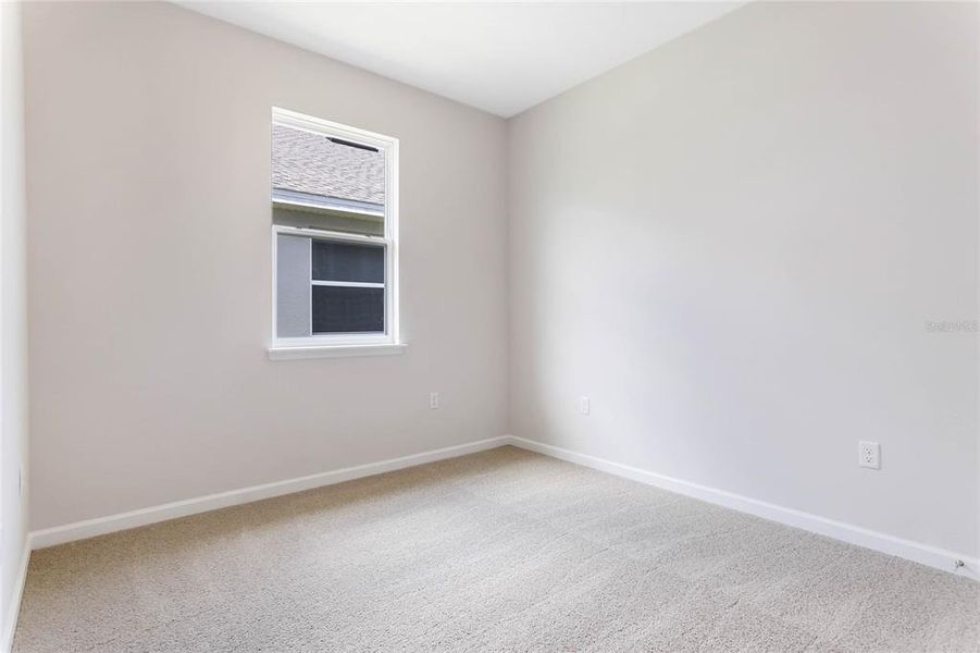 Spacious, unfurnished interior of a new home in Grand Isle, Grand Island (Image 12).