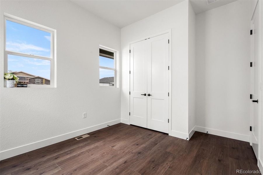 Spacious, unfurnished interior of a new home in Wolf Ranch - Enclave Collection, Colorado Springs (Image 33).