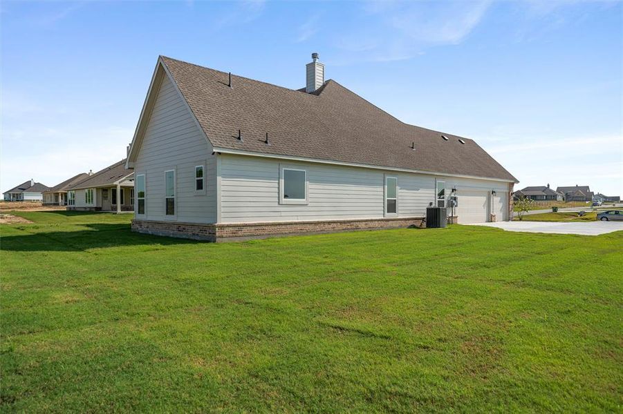 Front exterior of a new home in Fairview Meadows, New Fairview, TX, highlighting curb appeal (Image 2). Front exterior of a new home in Fairview Meadows, New Fairview, TX, highlighting curb appeal (Image 2).