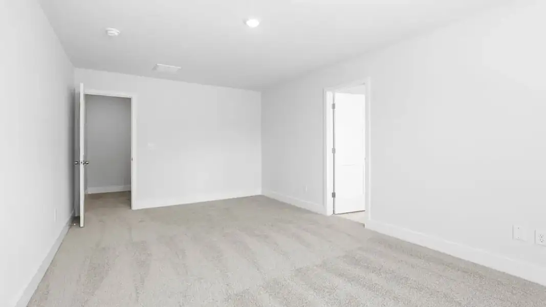 Representative unfurnished interior of a home built from the Lansing by D.R. Horton in Ashmore Hills, Mauldin (Image 30).