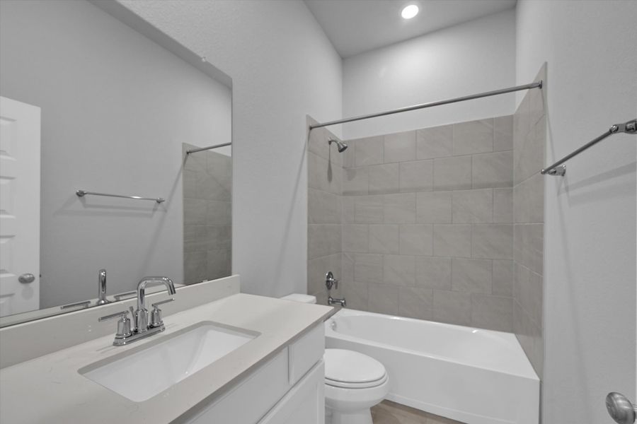Furnished interior view inside a new home in Sunterra 40, Katy (Image 5).