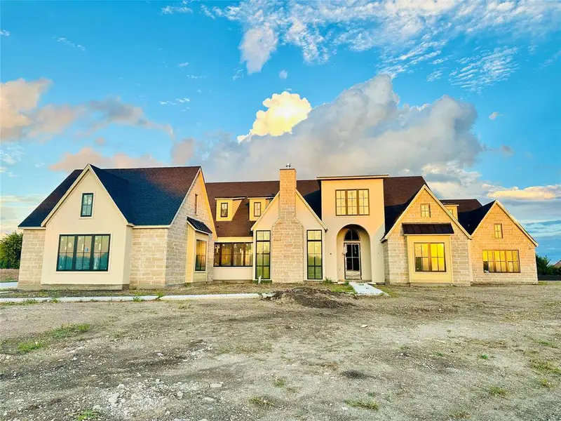 A striking, modern country-inspired architectural estate by the renowned luxury home builder, Ron McHam. Situated on a premium, 1.1-acre private cul-de-sac lot in prestigious Chamberlain Park. Single-story masterpiece with dramatic oversized fir beams, modern steel and glass entry, and expansive Anderson glass window wall systems connecting the interior to outdoor living. A striking, modern country-inspired architectural estate by the renowned luxury home builder, Ron McHam. Situated on a premium, 1.1-acre private cul-de-sac lot in prestigious Chamberlain Park. Single-story masterpiece with dramatic oversized fir beams, modern steel and glass entry, and expansive Anderson glass window wall systems connecting the interior to outdoor living.