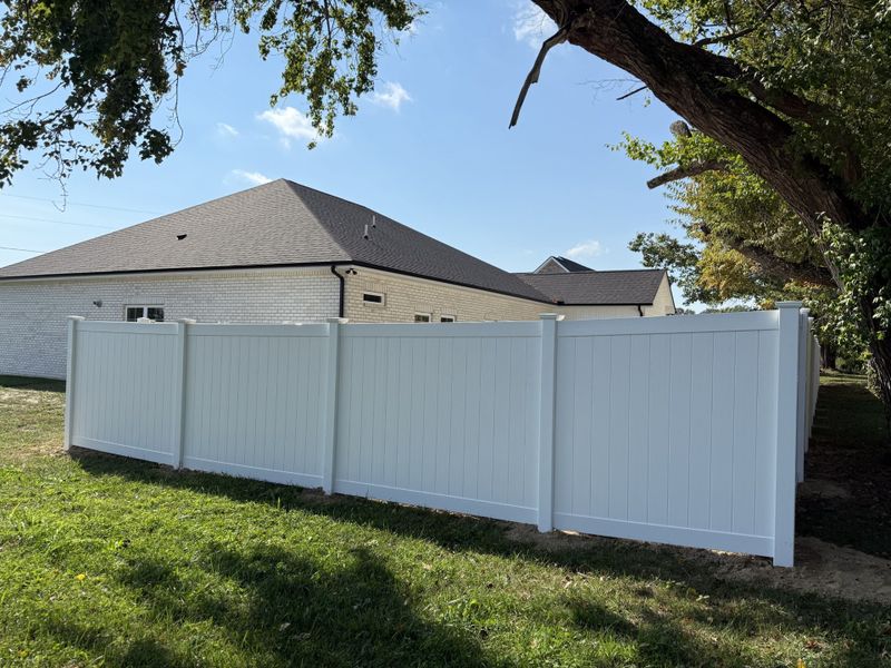 Exterior details and patio area of a home in Fox Run, Manchester (Image 23).