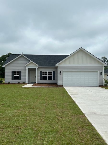 Front exterior of a new home in , Orangeburg, SC, highlighting curb appeal (Image 2).
