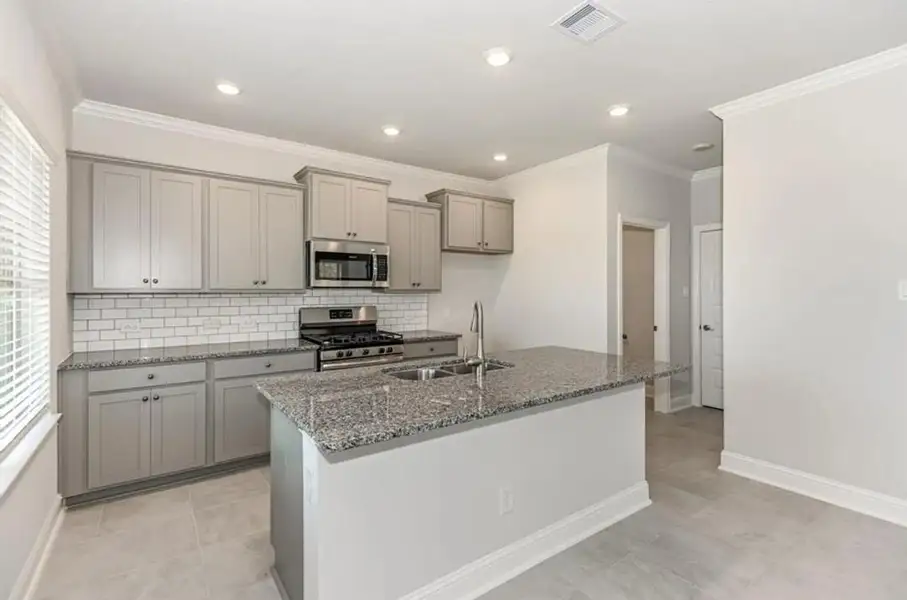 Furnished interior view inside a new home in Kiber Reserve, Angleton (Image 6).