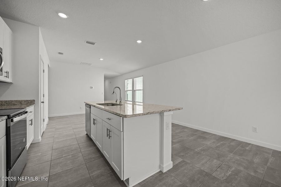 Furnished interior view inside a new home in Lakes at Bella Lago – Classic Series, Green Cove Springs (Image 6).