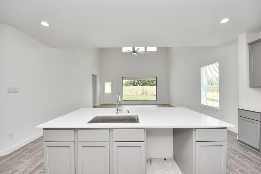 All of this overlooks your expansive family room, creating a perfect space for culinary delights and family gatherings. All of this overlooks your expansive family room, creating a perfect space for culinary delights and family gatherings.
