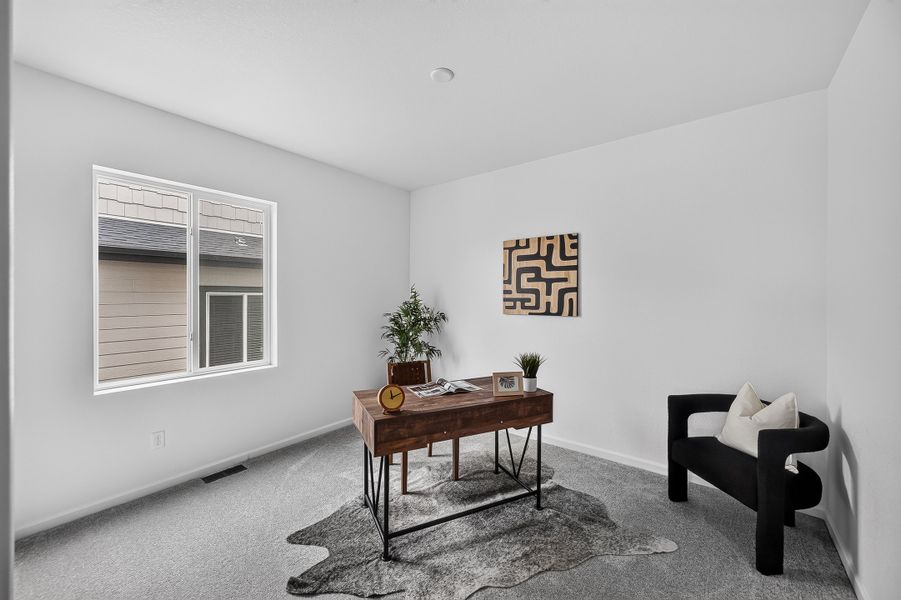 Furnished interior view inside a new home in Trailstone, Arvada (Image 13).