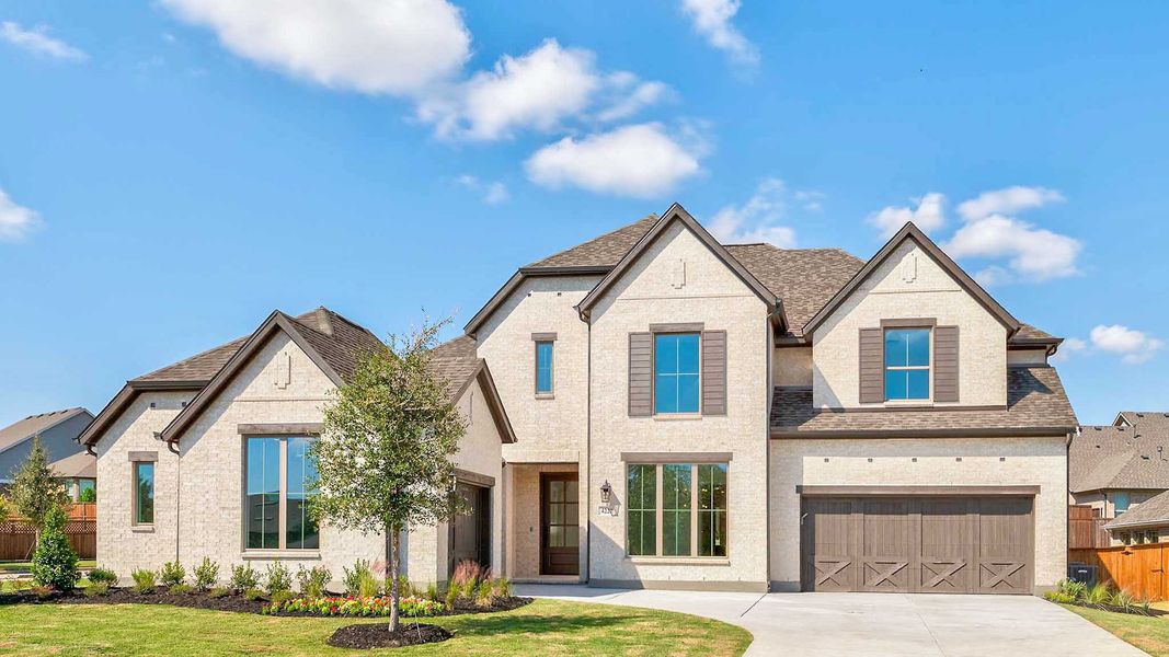 Front exterior of a new home in Somerset Park, Rockwall, TX, highlighting curb appeal (Image 1). Front exterior of a new home in Somerset Park, Rockwall, TX, highlighting curb appeal (Image 1).