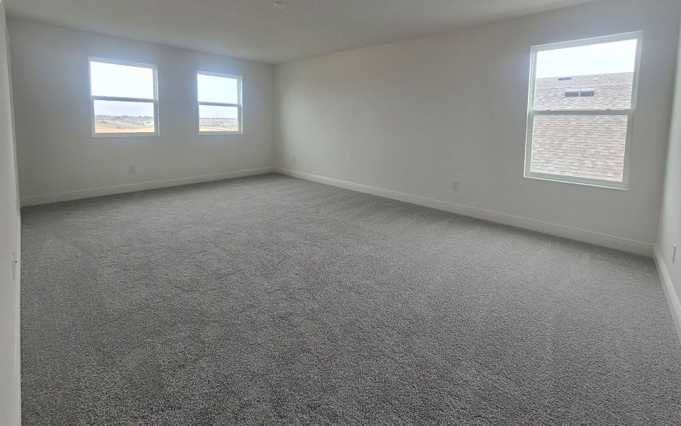 Spacious and Relaxing Primary Bedroom in Central Florida Home