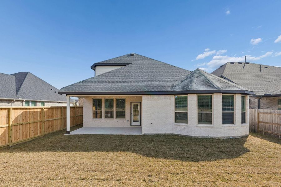 Exterior details and patio area of a home in Mavera, Conroe (Image 3). Exterior details and patio area of a home in Mavera, Conroe (Image 3).