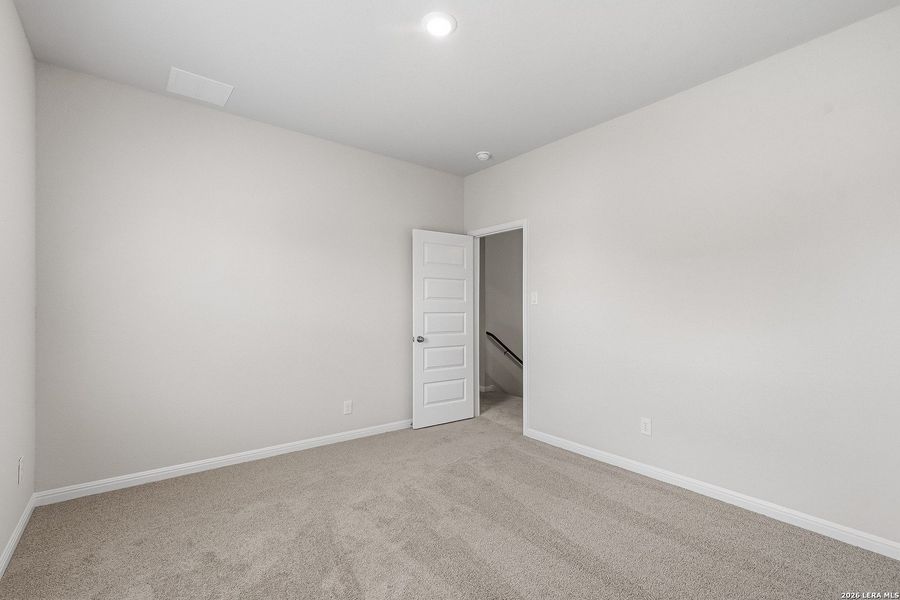 Spacious, unfurnished interior of a new home in Melissa Ranch, San Antonio (Image 23).