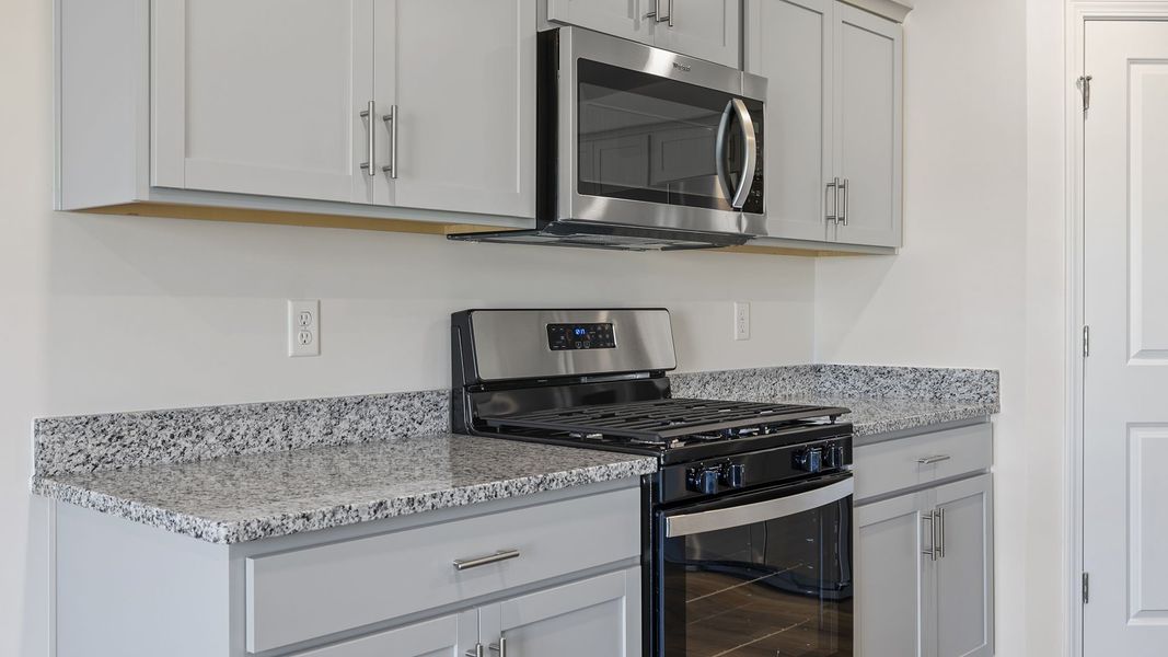 Furnished interior view inside a new home in Bentley Park, Greenwood (Image 10).
