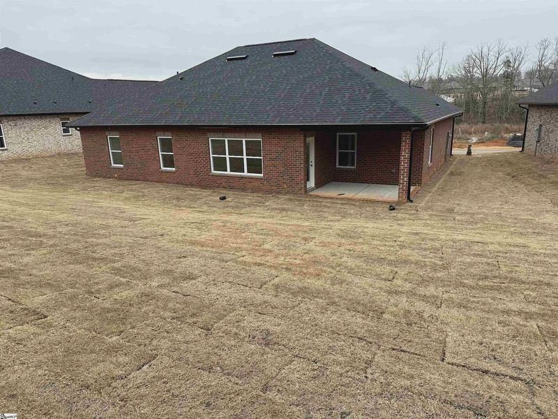 Exterior details and patio area of a home in Hidden Lake Estates, Greenville (Image 11).