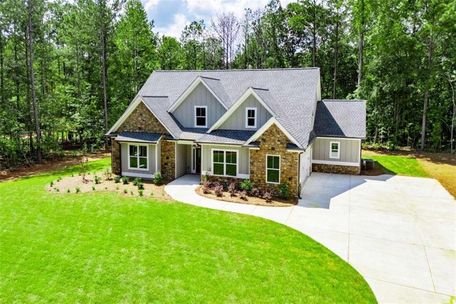 Front exterior of a new home in , Douglasville, GA, highlighting curb appeal (Image 30).