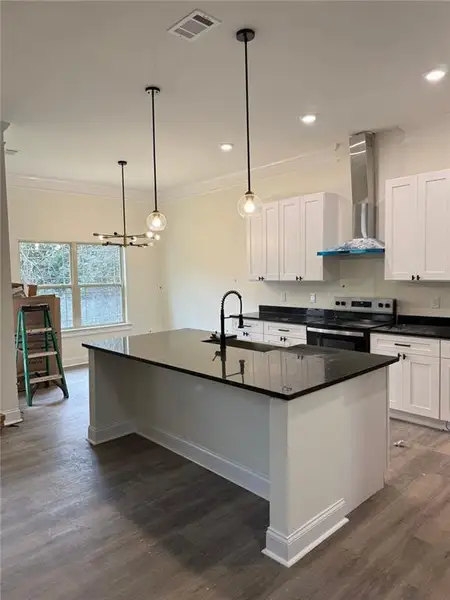 Furnished interior view inside a new home in , Warner Robins (Image 1).