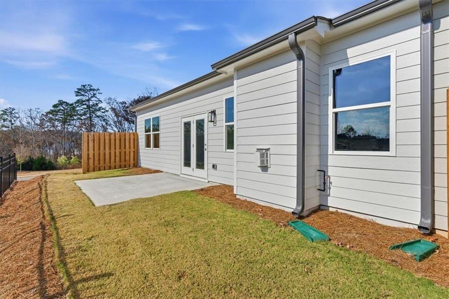 Exterior details and patio area of a home in Lakeside at Great Sky, Canton (Image 24).