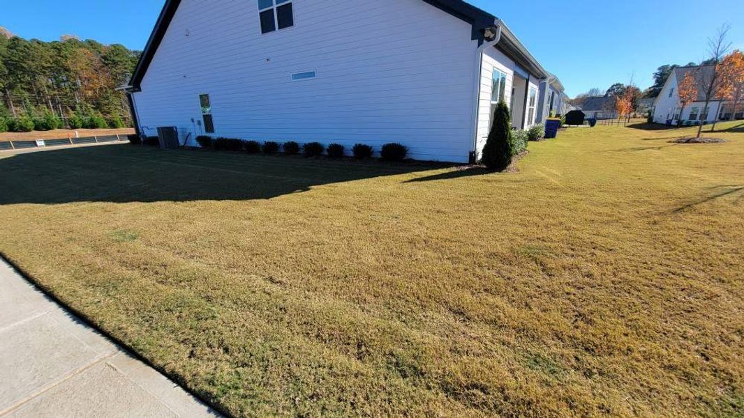 Exterior details and patio area of a home in The Reserve at Bells Ferry, Kennesaw (Image 26).
