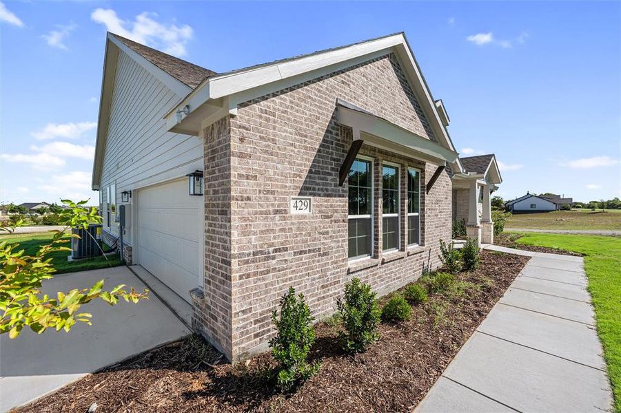 Exterior details and patio area of a home in Fairview Meadows, Rhome (Image 20). Exterior details and patio area of a home in Fairview Meadows, Rhome (Image 20).