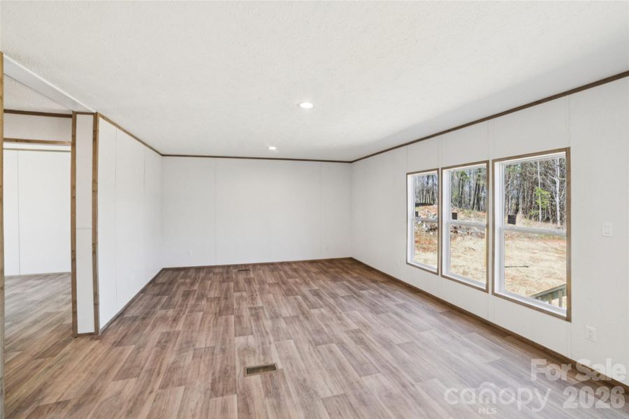 Spacious, unfurnished interior of a new home in , Vale (Image 10).