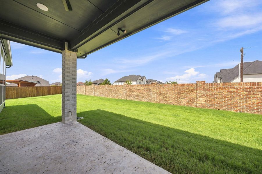 Exterior details and patio area of a home in Estates at Rockhill, Frisco (Image 3). Exterior details and patio area of a home in Estates at Rockhill, Frisco (Image 3).