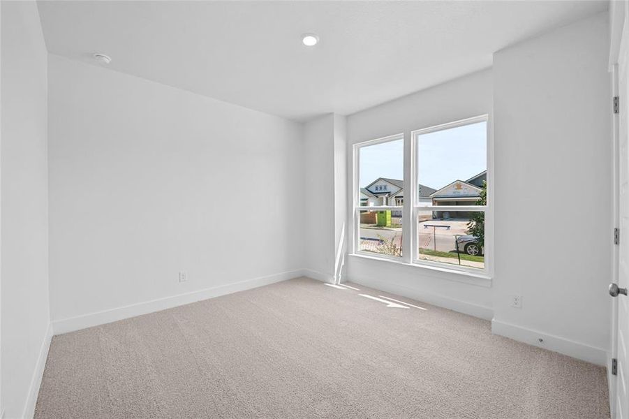 Please Note: These interior photos are not of the actual home but are of a completed one with a similar floor plan. Finishes, features, and layouts may vary.