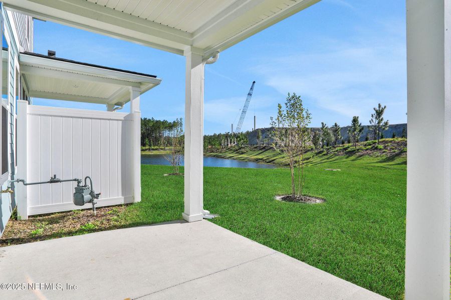 Exterior details and patio area of a home in Brook Forest - Townhomes, St. Augustine (Image 29).