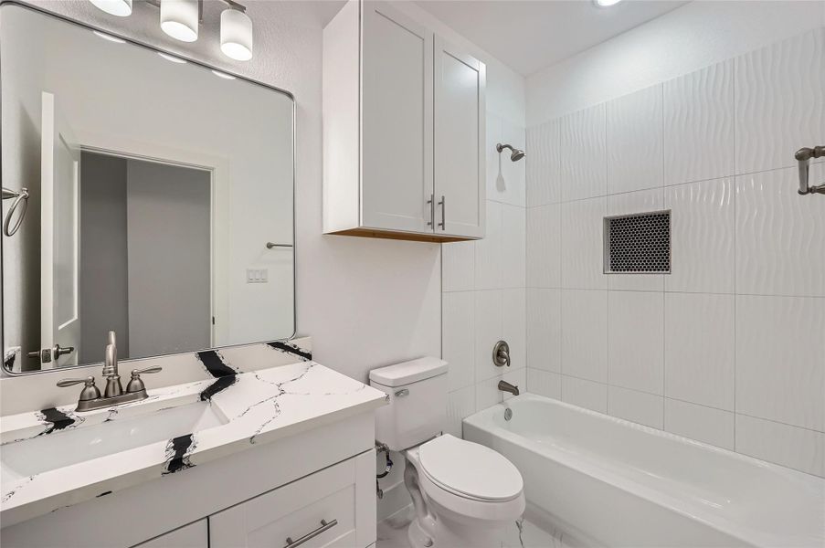 Full bathroom #3 with vanity and washtub / shower combination